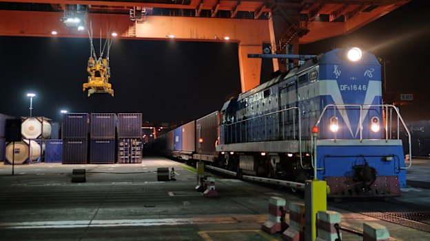 A China Railway Express train points west from Chongqing loaded with LED lights and mobile phones. China expects to run 1000 such expresses to Europe in 2018.  