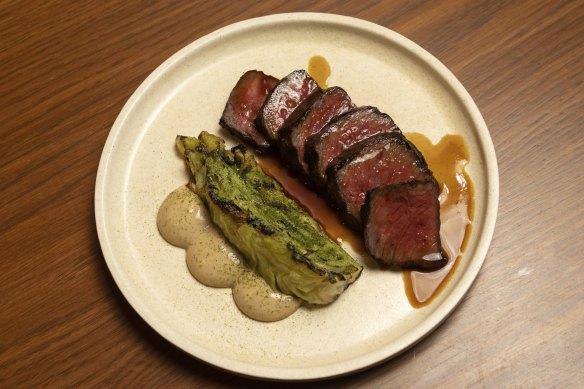 Wagyu rump cap with cone cabbage and black garlic bagna cauda. 