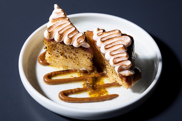 Tres leches cake topped with torched Aperol meringue.