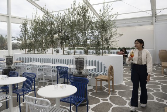 Olympia Wine’s rooftop is all blue and white.