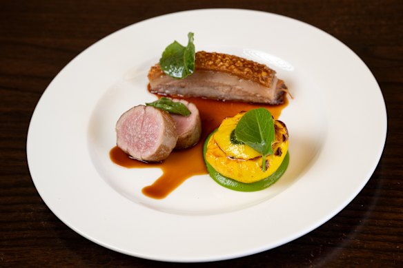 Pork loin and jowl, stuffed squash and cider sauce.