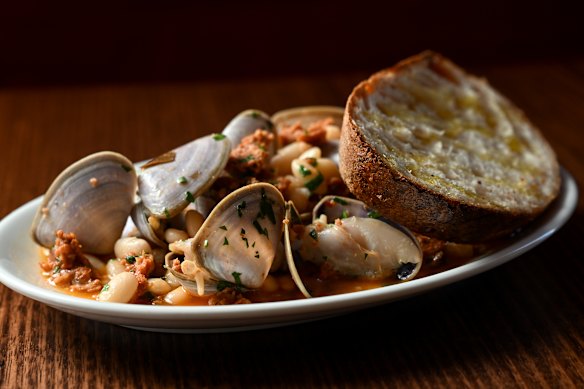 Clams with chorizo, white beans, garlic and parsley.