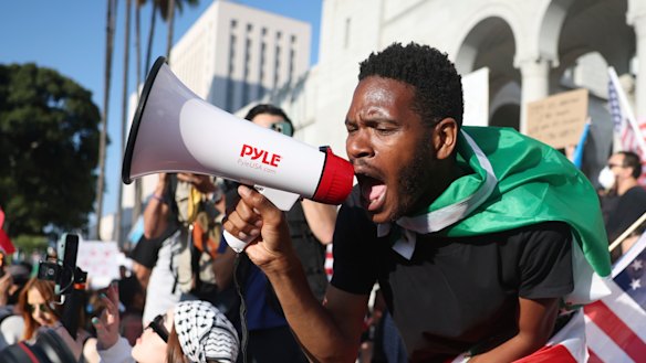 Protesters gather outside City Hall in Los Angeles on Wednesday. 