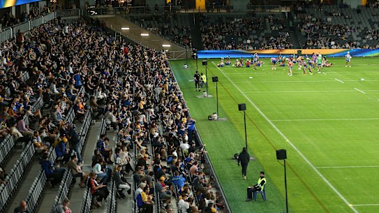 Crowded house: Parra fans watch the Eels' first public training session at Bankwest Stadium. 