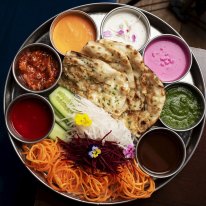 SYDNEY, AUSTRALIA, GOODFOOD,  February 21: Pappadum, chutney and naan platter at Don't Tell Aunty in Surry Hills on February 21, 2019 in Sydney, Australia.  (Photo by Christopher Pearce/SMH)