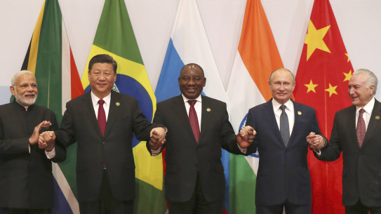 Chinese President Xi Jinping and South African President Cyril Ramaphosa at a forum in 2018.