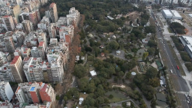 An areal view of the Eco Park in Buenos Aires, which has become surrounded by a sprawling urban zone of busy avenues with honking buses and screeching cars near the animal cages.