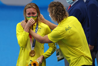 Ariarne Titmus and Dean Boxall share a special moment