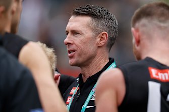 Magpie coach Craig McRae is not fazed by the Demons’ top position in the ladder.