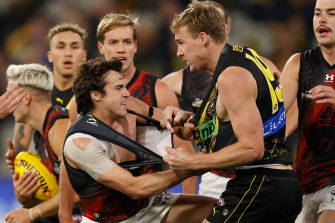 Richmond’s Tom Lynch (right) suffered a hamstring injury after a fiery start.