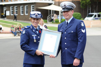 Former deputy commissioner Lucinda Nolan presenting Calum McCann with a certificate in 2011. There is no suggestion that Ms Nolan was aware of or had any involvement in Mr McCann’s alleged actions.