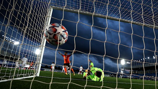 Real Madrid gloveman Thibaut Courtois fails to stop an own goal from teammate Raphael Varane during the Spaniards' shock Champions League loss to Shakhtar Donetsk.