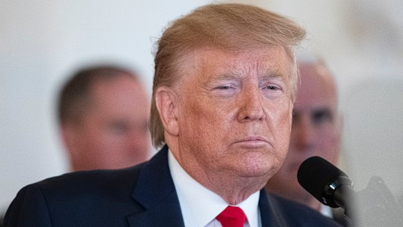 Trump used what could have been a unifying moment to take aim at his predecessor over Iran.