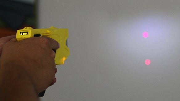 Tasers emit red laser dots to show where they are firing.