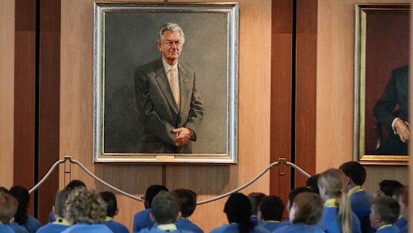 Students from Lake Joondalup Baptist College in Western Australia in front of former prime minister Bob Hawke's portrait during their tour of Parliament House this week. 