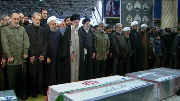 Ayatollah Ali Khamenei, fourth from left, leads a prayer over the coffins of General Qassem Soleimani and his comrades.