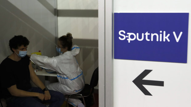 A man receives a COVID-19 vaccine at a vaccination centre in Belgrade, Serbia.