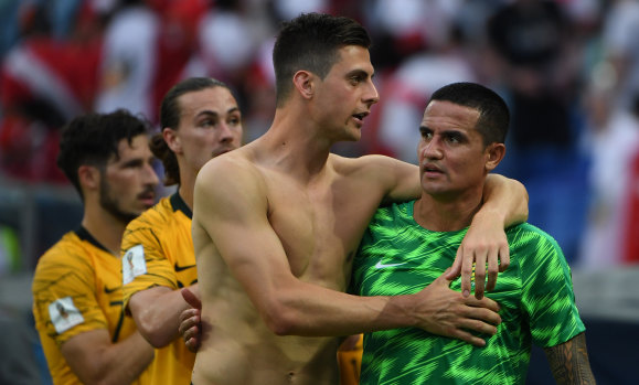 Mat Leckie, Jackson Irvine, Tomi Juric and Tim Cahill after the Socceroos' loss to Peru at the World Cup.