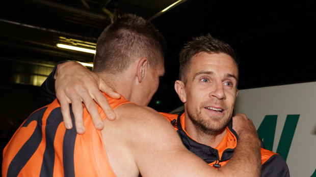 Wing and a prayer: Brett Deledio celebrates the win but is a long shot to play in the decider.