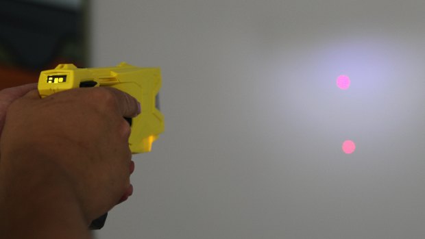 Tasers emit red laser dots to show where they are firing.