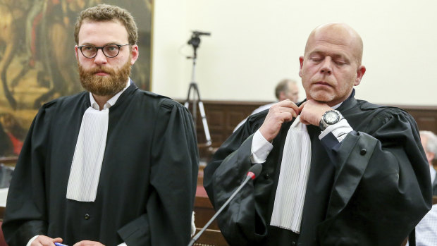 Lawyers for the accused Romain Delcoigne, left, and Sven Mary.