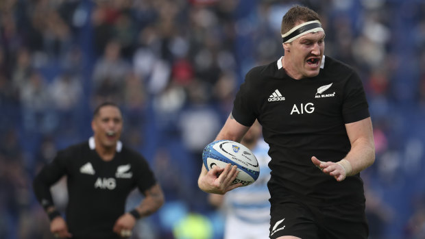 Heart-breaker: Brodie Retallick streaks away unopposed to score a crucial try for the All Blacks.
