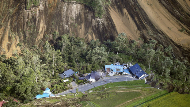 Houses destroyed by a landslide after an earthquake in Atsuma town, Hokkaido.