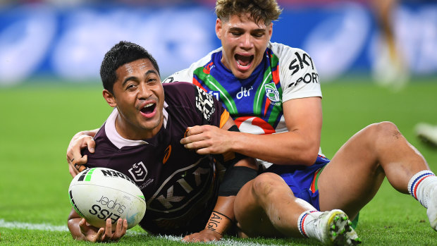 Milford (left) scoring a try for the Broncos against the New Zealand Warriors in 2021.