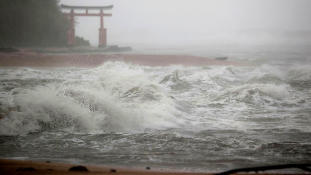 Waves batter the shore in Miyazaki, southern Japan, on Sunday as a powerful typhoon approaching Japan lashed the region with strong winds and heavy rain.