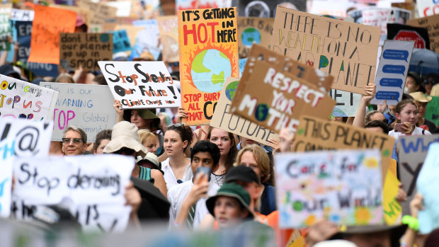 School students join a "climate change strike" in Brisbane earlier this year.