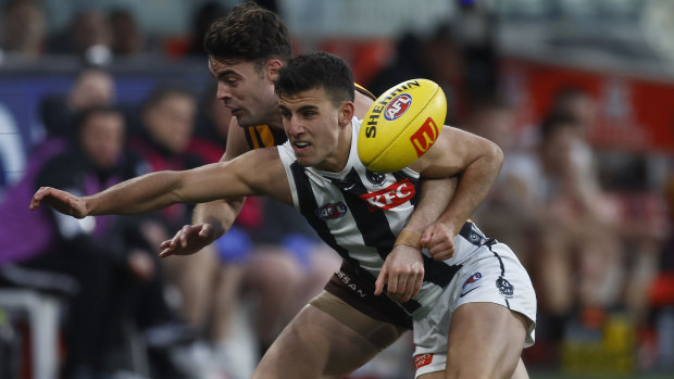 Nick Daicos was in the thick of the action for Collingwood against Hawthorn before succumbing to a knee injury.