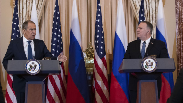 Russian Foreign Minister Sergei Lavrov speaks as US Secretary of State Mike Pompeo listens after their meeting at the State Department in Washington. 