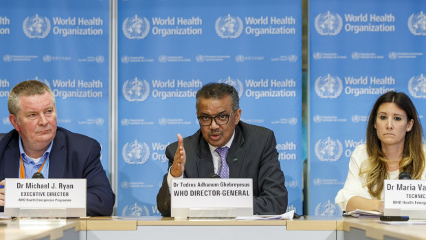 Tedros Adhanom Ghebreyesus, centre, said the coronavirus pandemic was accelerating.