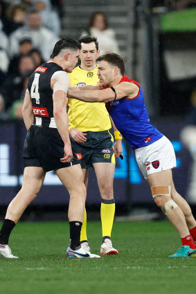 Melbourne’s Jack Viney remonstrates with Collingwood’s Brayden Maynard.