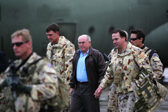 Prime Minister John Howard arriving in Kabul, Afghanistan, in 2005. 