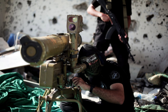 A Hamas fighter at an emplacement in the Shujaya neighborhood of Gaza City in 2014.