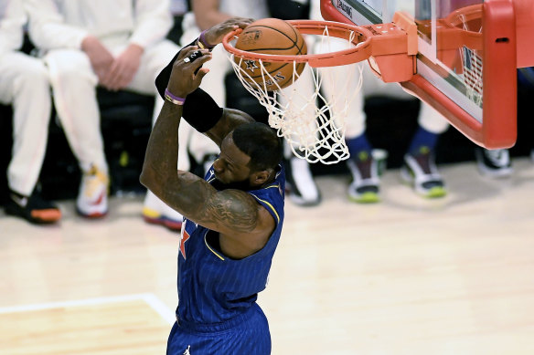 LeBron James dunks during the 69th NBA All-Star Game.