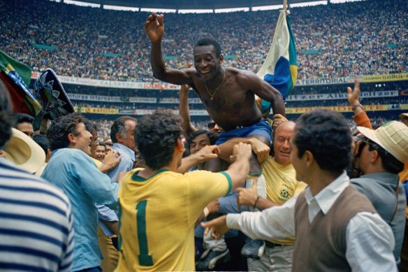 Brazil's Pele is hoisted on the shoulders of his teammates after Brazil won the 1970 World Cup final against Italy.