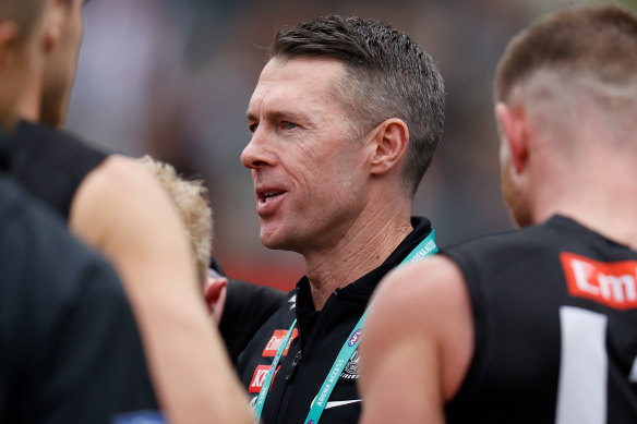Magpie coach Craig McRae is not fazed by the Demons’ top position in the ladder.