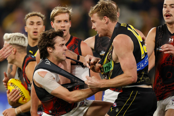 Essendon’s Andy McGrath remonstrates with Tom Lynch.