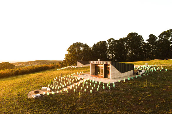 The three cabins are edged by a cherry orchard.