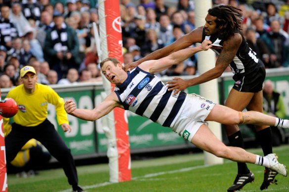 Heritier Lumumba (right), then Harry O’Brien, playing for Collingwood in the 2011 grand final.