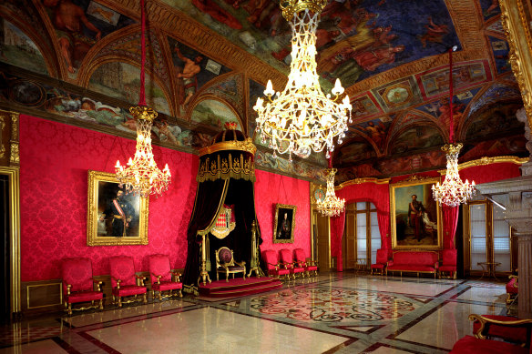 Dramatic ceiling art among the opulent interiors at Princely Palace.