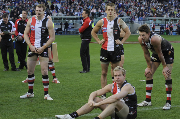 Disappointed St Kilda players, including Brendon Goddard (left).
