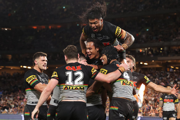 The Panthers celebrate Charlie Staines’ second-half try.