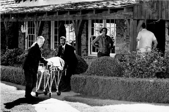The body of actress Sharon Tate is taken from her rented house on Cielo Drive in Beverly Hills, California, on August 9, 1969. 