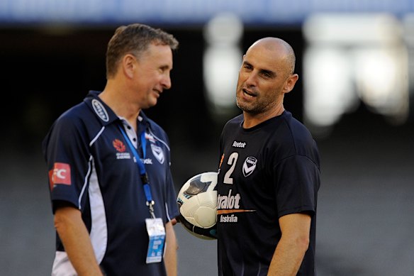 Good old days: Former Victory coach Ernie Merrick with captain Kevin Muscat in 2010.