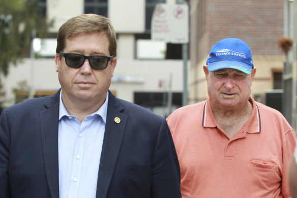 Troy Grant (left) pictured with his father Kenneth Grant in December 2019.