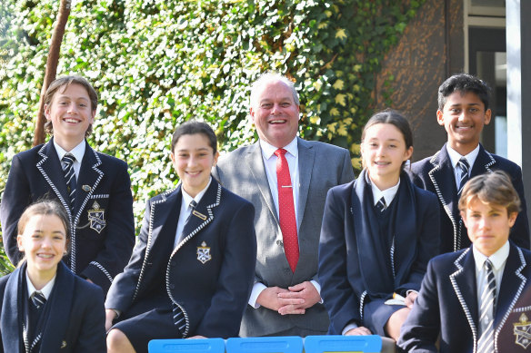 Mentone Grammar principal Mal Cater and Year 8 students.