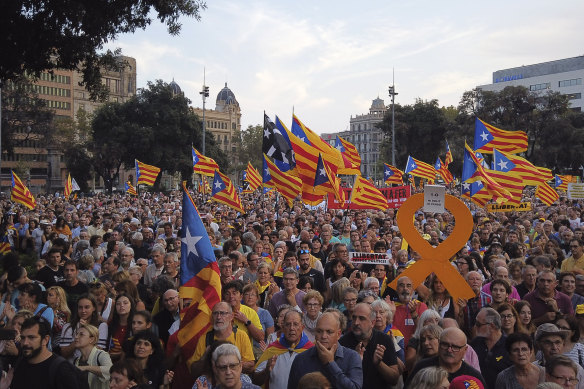 Thousands of secession supporters march during a demonstration in Barcelona on Tuesday.